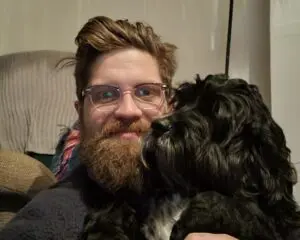 Picture of James and his dog