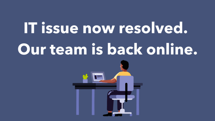 A blue background with an illustration of a man sitting at a desk looking at this computer. White text reads: IT issue now resolved. Our team is back online.