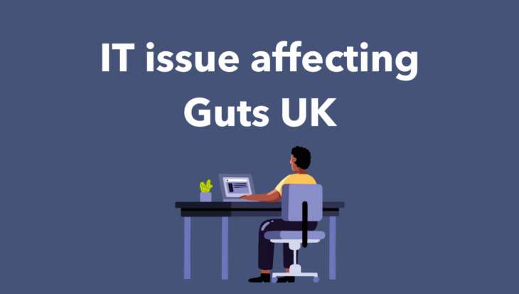 The text IT issues affecting Guts UK are written in white on a blue background, alongside an illustration of a person sat at a desk looking at their computer.