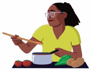 Guts UK brand cartoon characters of a woman cooking. She is raising a wooden spoon from the pan to taste the food and there are various vegetables in front of her. She is smiling and wears a green V-neck top. 