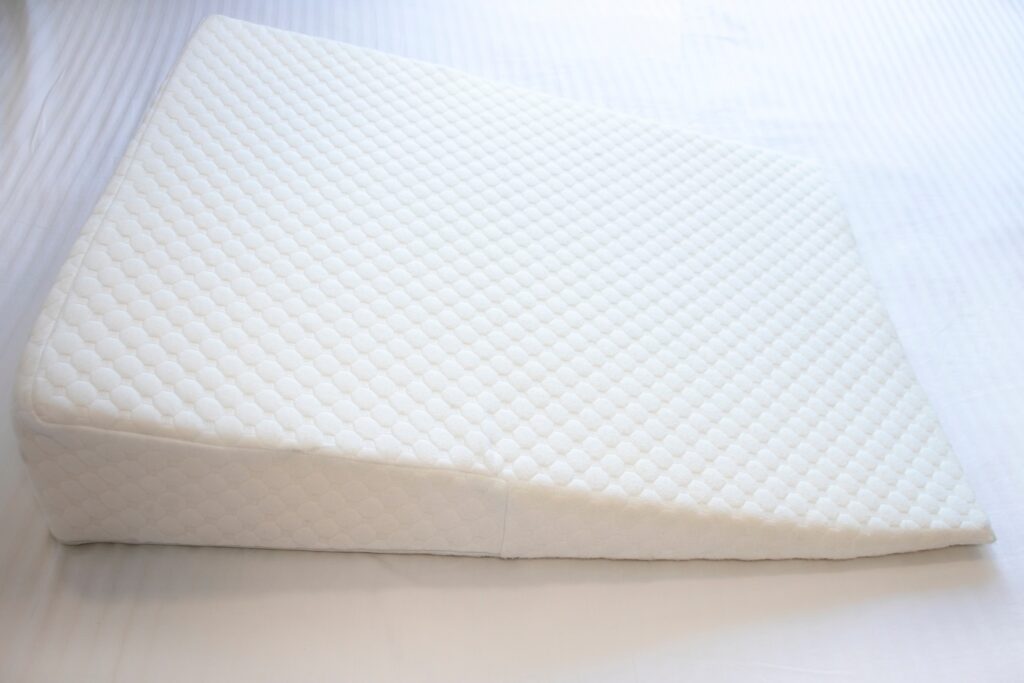 A white wedge pillow